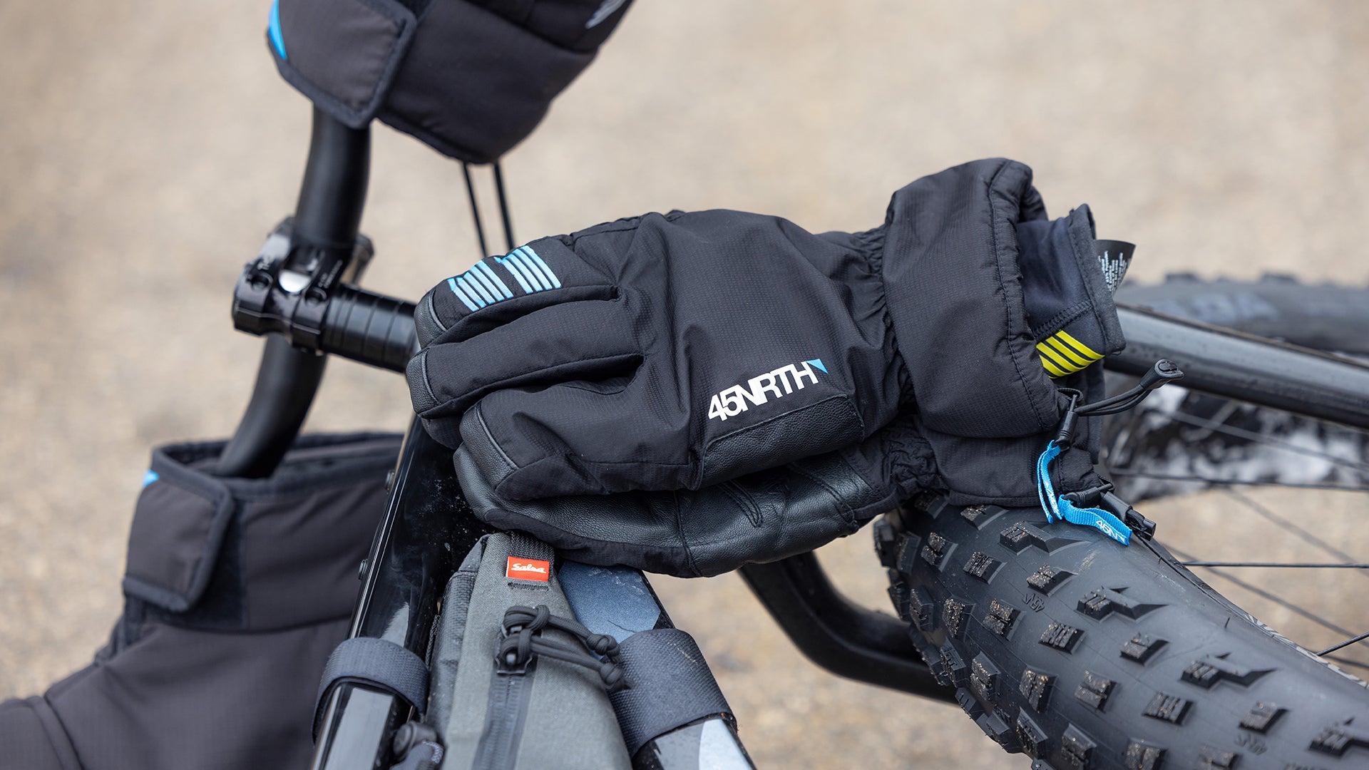 45NRTH Gloves on fat bike laying on ground