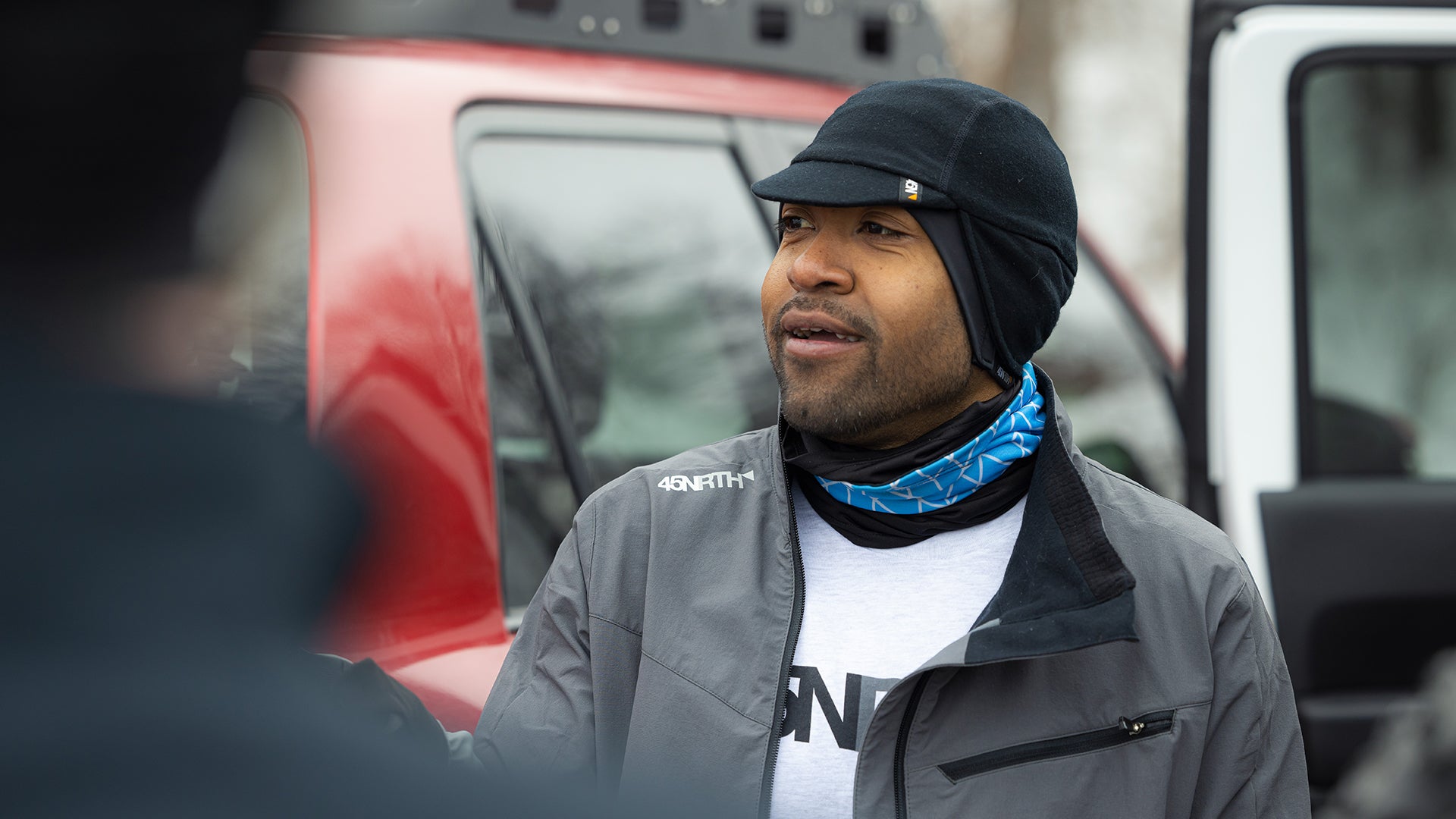 Person wearing 45NRTH Greezy Wool Cap outside