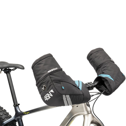 45nrth Cobrafist Pogies - Black - Front three quarter view on handlebars